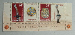 1996. Honfoglaláskori emlékek - ívsarki szelvényes pár; tarsolylemez, szablya, hajfonatkorong