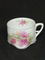 Antik szecessziós, virágmintás, anyagában domború növénymotívumos, porcelán csésze