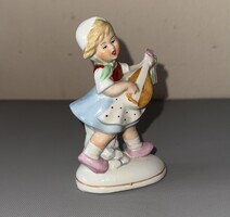 Lantozó kislány porcelán figura