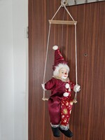 Hintázó, porcelán fejű bohóc baba