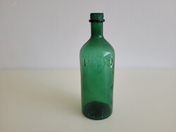 Retro old hypo poison green glass bottle with embossed lettering
