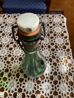 Old Retro Green Clasp Bottle. Slight damage on the white porcelain. Well sealed.