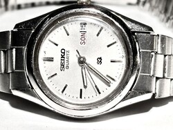 Nöi fémszíjas Seiko Új elemmel, órás által polírozva!  Szélesebb csuklóra is jó lehet!  Minden funkc
