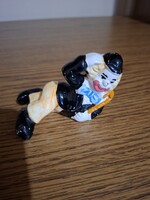 Porcelán fekvő bohóc.