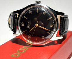 Fexete számlapos doxa jumbó 1950-es évek több mint 38 mm átmérő k.n. pontos órásgarancia Zara Omega