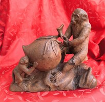 Majmok gyümölccsel. Japán faszobor XIX-ik század vége.