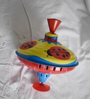 Lemez játék , búgócsiga 15 x 18 cm , katica minta , működik !