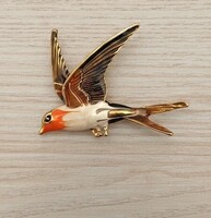 Arany színű repülő madár bross – igényes kidolgozású, elegáns ékszer