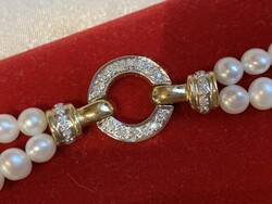 Diamond clasp with gold links, double row pearl necklace. With certificate.