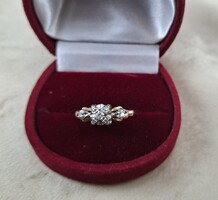 Gold engagement ring with diamond
