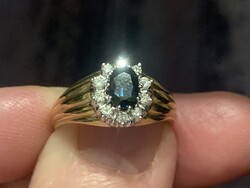 0.50Ct diamonds and sapphire gold ring. With certificate