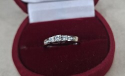 Gold diamond-studded engagement ring