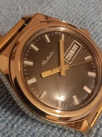 Elegáns aranyozott Raketa karóra