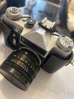 Eladó klasszikus Zenit-E analóg fényképezőgép eredeti bőrtokkal és Helios objektívvel. Masszív, fémh