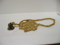 Pici réz csengő arany színű horgolt csillagon karácsonyra