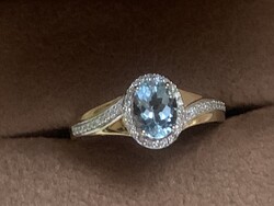 Gold ring with diamonds and aquamarine. NEW.