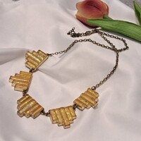 Aranyozott tűzzománc nyaklánc.