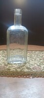 Schrank old liqueur bottle.