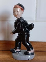 Kéményseprő figura, amely a szerencse és a jólét hagyományos szimbóluma.