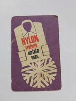 NYLON FEHÉRÍTŐ HÓFEHÉR RUHA kártyanaptár 1970