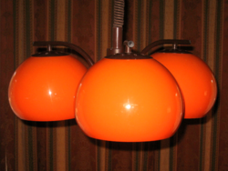 Retro chandelier with orange shade