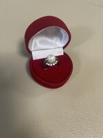 White gold diamond ring with pearl and snow-white stone.