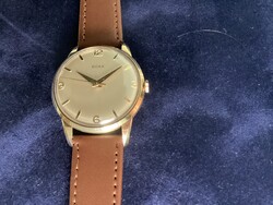 14k gold Doxa still with the more robust gold casing