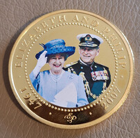 Cook-szigetek 1 dollár, 2007 - Erzsébet világoskék öltönyben és tollas kalapban - Gyűjtői érme
