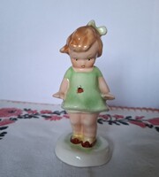 Bodrogkeresztúri zöld ruhás katicás kislány figura.
