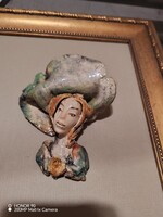 Prácser Edit ceramic in frame.