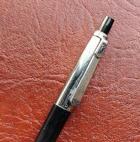 Pevdi Pax. Rare plastic push-button type.