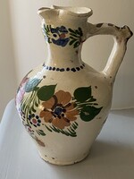 Old floral pattern rattle jug