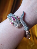 Important 14 k gold ruby and diamond serpent bracelet cuff