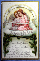 Antique embossed Christmas greeting card - singing angels with pine branch