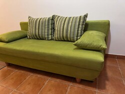 Almond green sofa bed with upholstery cleaner, cleaned