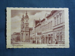 Postcard, Nyíregyháza, Bethlen Street, church, hairdresser shop view, detail, Weinstock Budapest edition, 1940-