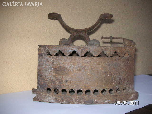 Old cast iron iron as in the picture ....