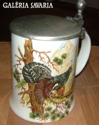 Hand-made mug with a pewter cover with wood grouse pattern