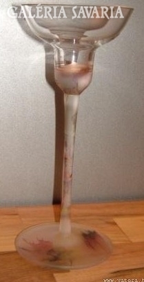 A special painted candle holder with a base
