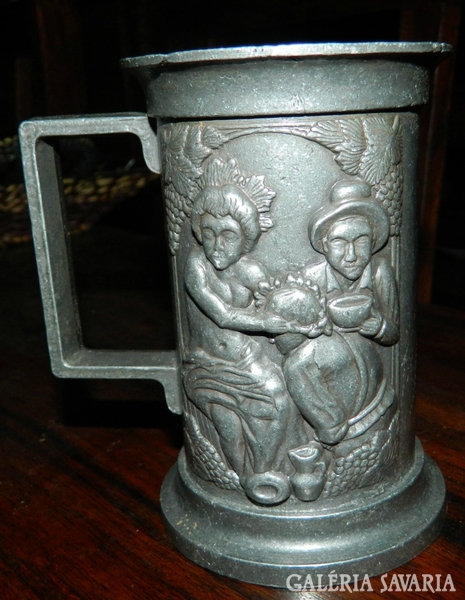 Extra embossed, extra old pewter cup with ears