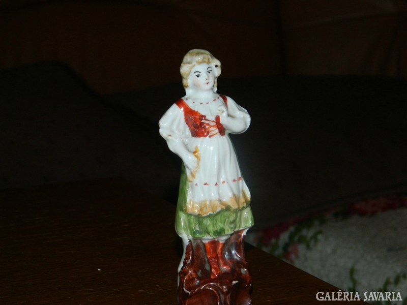 Antique numbered approx. 100-year-old girl
