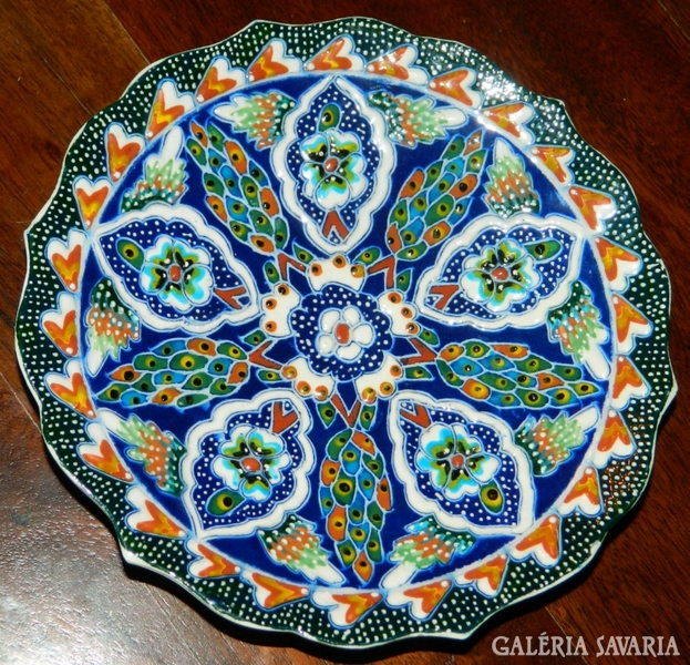 A beautiful hand-painted, marked decorative plate