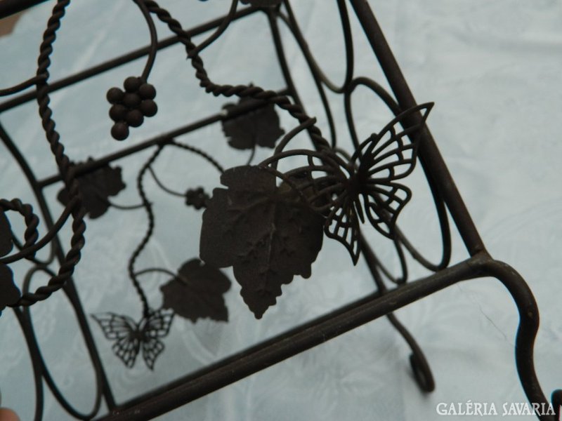 Antique iron drink holder with grape leaf and butterfly pattern