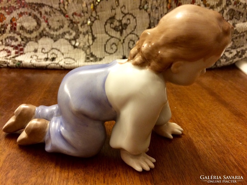 Zsolnay climbing child figurine