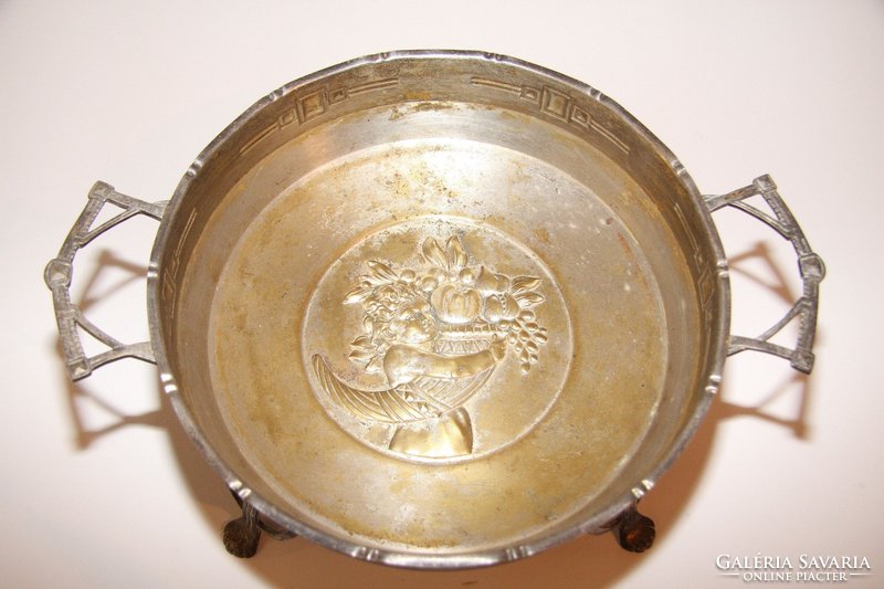 Fruit bowl in silver-plated center with an angel holding a bouquet of flowers