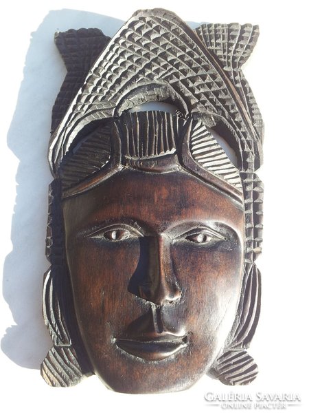 African black woman with wooden mask