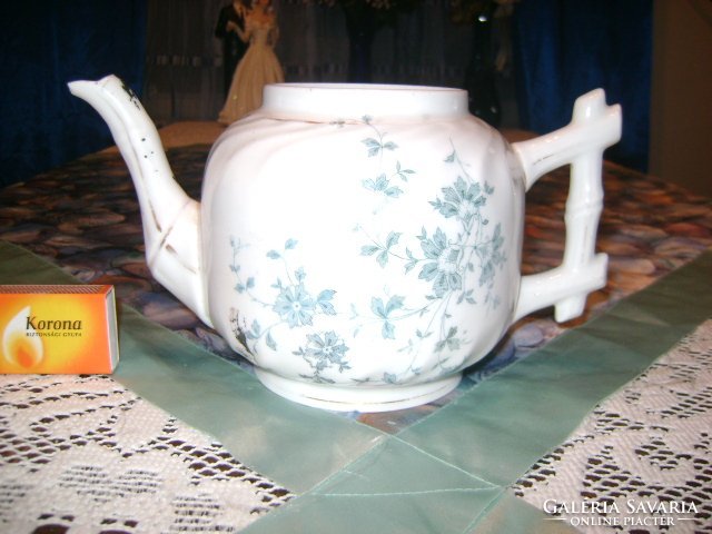 Antique porcelain tea pourer