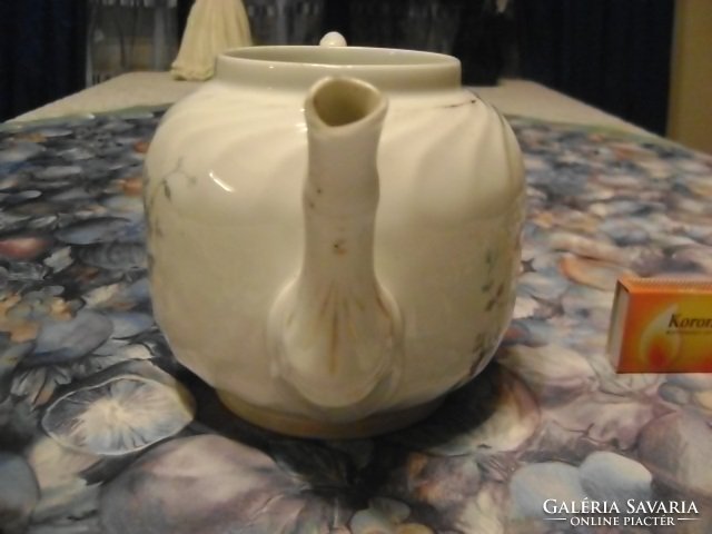 Antique porcelain tea pourer