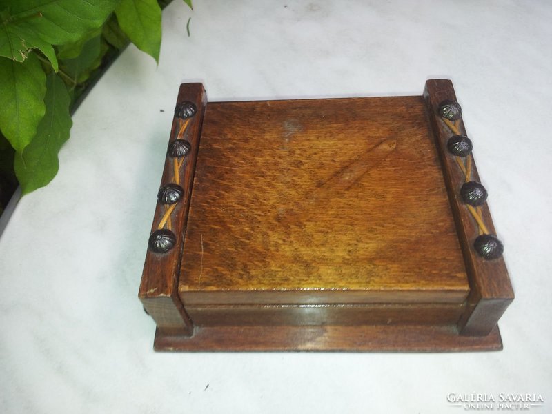 Wooden box offering antique cigarettes