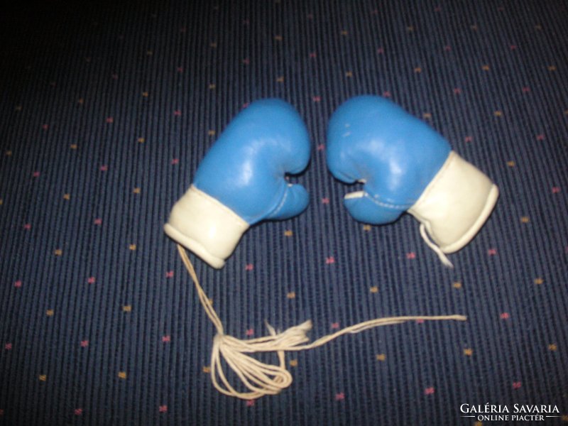 Mini boxing gloves made of leather, hand sewing
